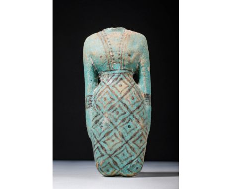 Middle Kingdom, Ca. 1991 - 1790 BC.A rare faience of a hand-built concubine, nude and covered in turquoise-hued glaze, with a