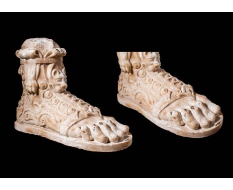 Ca. AD 150 - 250.A marble left foot with five elongated toes, delineated toenails, and an upward-arching bridge. The foot is 