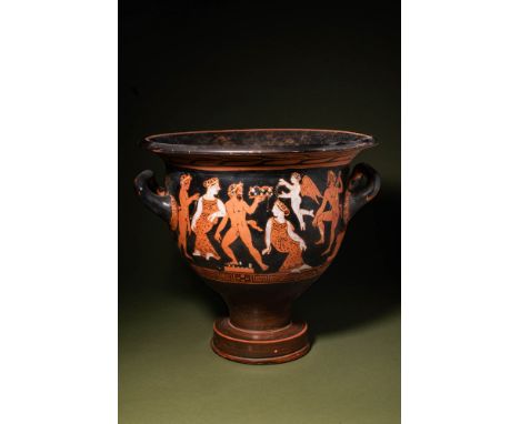 Ca. 400 - 350 BC.A red-figure pottery bell krater with a large body, short splayed foot, a flanged mouth, and two well-preser