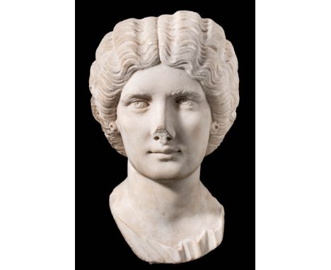 Ca. Early 3rd century AD.An over life-sized portrait, gracefully sculpted, the Empress portrayed as a mature woman, her oval 