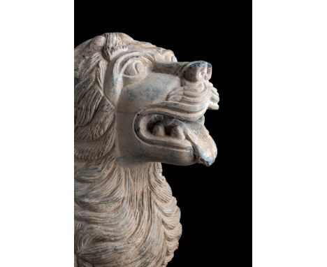 Ca. AD 200 - 300.A greenschist lion features a slender body and a mane that rests on its shoulders, with locks resembling fla