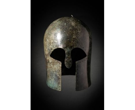 Ca. 500 - 450 BC.A fantastic Greek Corinthian hoplite bronze helmet, likely cast and then hammered into shape, belongs to a t