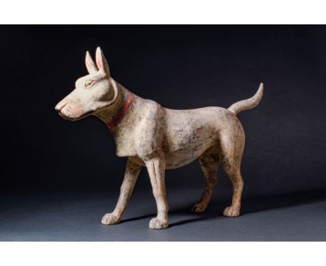 Ca. 202 BC - AD 220.An alert dog with a strong, protective stance and a fierce disposition, mould-made from baked terracotta.
