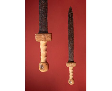 Ca. AD 100 - 300.An iron gladio of a bifacial design bearing a shallow midrib, sharp edges, and a pointed tip. Situated along