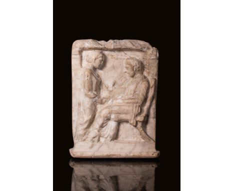 Ca. Late 400, beginning of 300 BC.A splendid marble votive stele carved with the relief image of two figures. Likely represen
