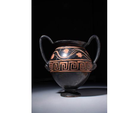 Ca. 330 - 300 BC.A Xenon ware miniature pottery kantharos. The vessel has a globular body elevated on a small circular foot, 