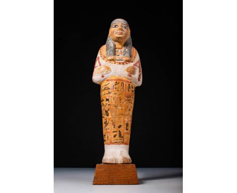 New Kingdom, 19th Dynasty, Ca. 1292 - 1190 BC.A limestone ushabti with extraordinary original pigment preserved, featuring bl
