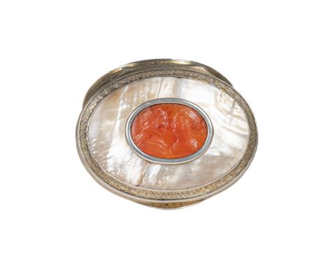 European Circa 1800 A mother of pearl, carnelian and silver snuff box The oval shaped box set to the centre with a carnelian 