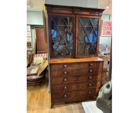 18th Century A secretaire book case Fitted with 12 satinwood faced desk drawers With architectural pediment