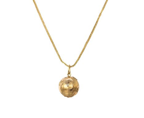 European Mid 20 Century A yellow gold pendant modelled as a globe on a fox tail link chain&nbsp; Weight: Approx: 12grams