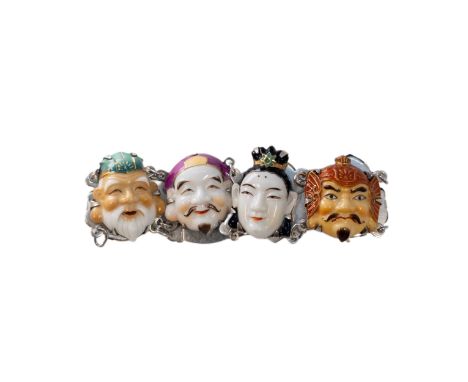 Japanese Circa 1930 A porcelain and silver seven portrait Gods bracelet Each head delicately painted