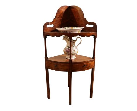 19th Century A mahogany washstand With floral jug and water basin&nbsp; Dimensions: 43 in. (H) x 21 in. (W) x 16 in. (D)