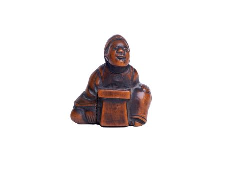 Japan A carved figural netsuke&nbsp; Dimensions: 1.5 in. (H) x 1.5 in. (W) x 0.75 in. (D)