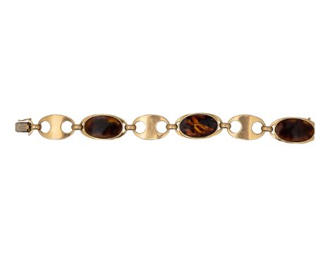 Circa 1970 A gold and faux tortoiseshell enamel necklace and bracelet The necklace comprising six oval enamelled yellow gold 