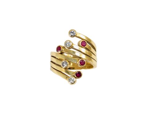 British circa 1970 A 18ct yellow gold ruby and diamond dress ring&nbsp; Weight: Approx. 21grams&nbsp; Dimensions: Finger size