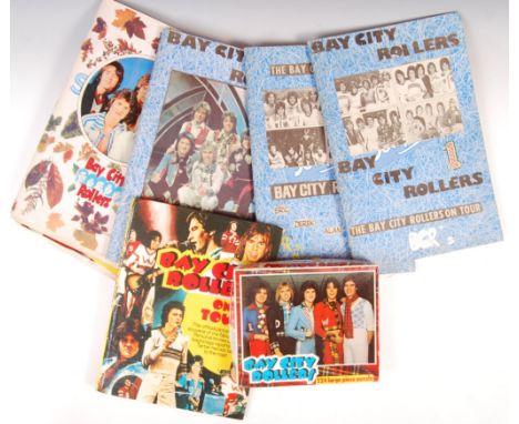 A large collection of assorted Bay City Rollers memorabilia to include cuttings, magazine articles, posters of the band from 