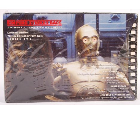 An original vintage 1990's Star Wars Empire Strikes Back Authentic 70MM film series two original trade box pack. Contains fiv