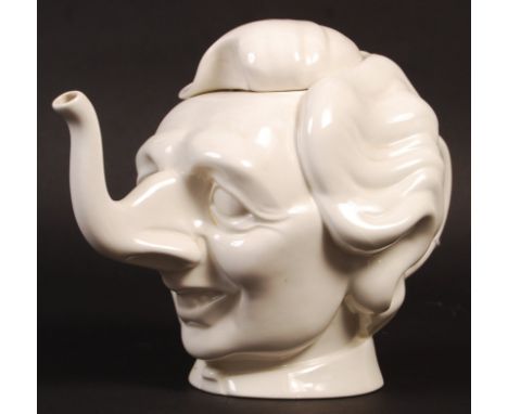 A rare 1980's Spitting Image style Margaret Thatcher teapot by Luck &amp; Flaw. The teapot with cartoon-like features, comple