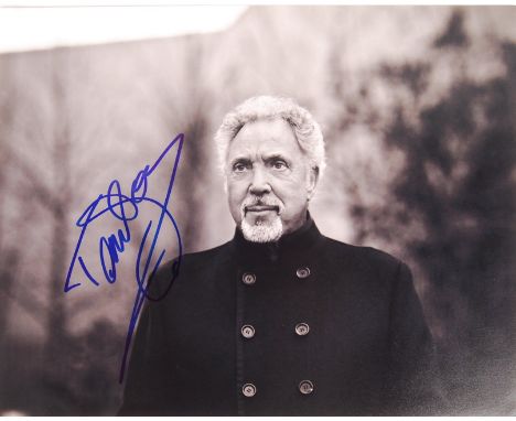 Tom Jones - Welsh Singer / Songwriter &amp; Presenter - hand signed 11x14" black and white photograph, depicting Jones in a h