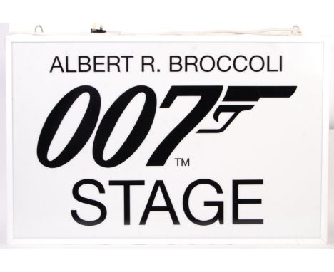 An incredible rare and original James Bond 007 Pinewood Studios sound stage hanging light-up sign. Reading ' Albert R. Brocco