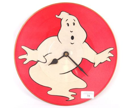 A vintage Ghostbuster themed wall clock constructed from a Ghostbusters Instrumental Version 12 inch vinyl record with Jungha