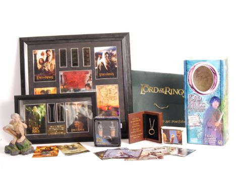 A collection of assorted Lord Of The Rings memorabilia - to include; a framed film cel presentation, an ' Artwork Portfolio '