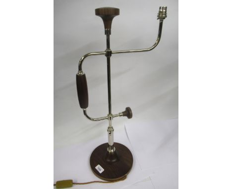 David Linley, silver plated and walnut table lamp, in the form of a woodworking brace, signed in the metal, 65cm highIn good 