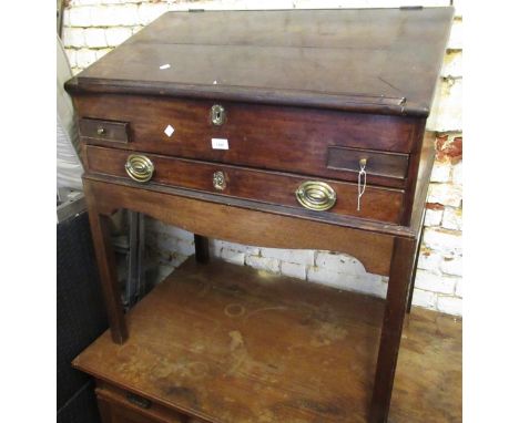 George III mahogany clerks desk, the sloping hinged cover enclosing a fitted interior above a single drawer on square chamfer