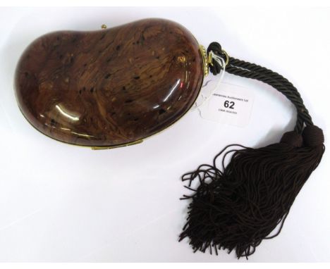 Christian Dior, bean shaped clutch bag with tassel handleJust marked on the inside. Does not close very well