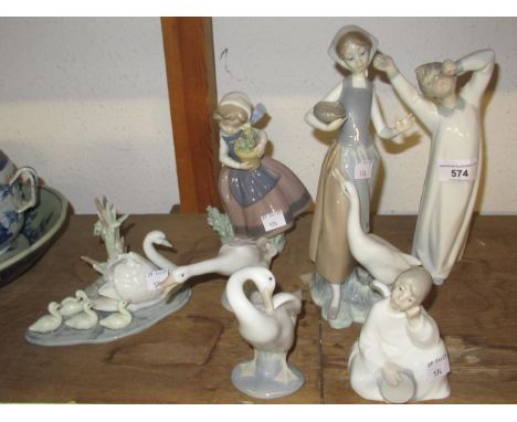 Group of six various Lladro figures, together with a Nao figure