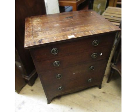 Early 19th Century mahogany and line inlaid commode, the hinged top above dummy drawers, raised on splayed feet