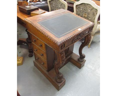 Victorian carved oak Davenport with hinged sloping top