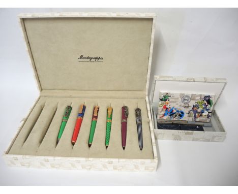Montegrappa, D C Comics Italy, group of six fountain and ballpoint pens, the clips cast with various figures, housed in a Mon