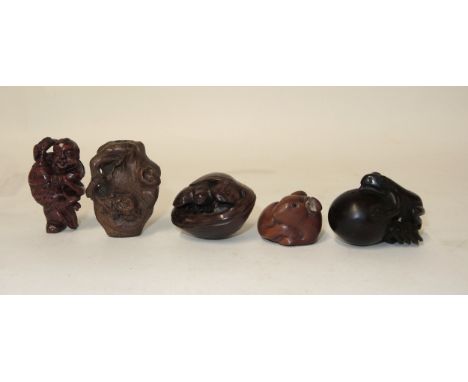 Group of five various Japanese carved hardwood netsuke