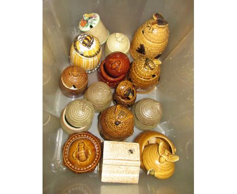 Collection of various pottery honey pots including Crown Devon etc.