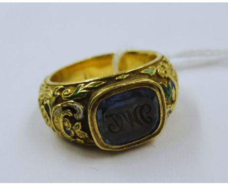 Good quality antique gold signet ring with blue intaglio glass monogrammed seal and traces of enamel decoration to the should