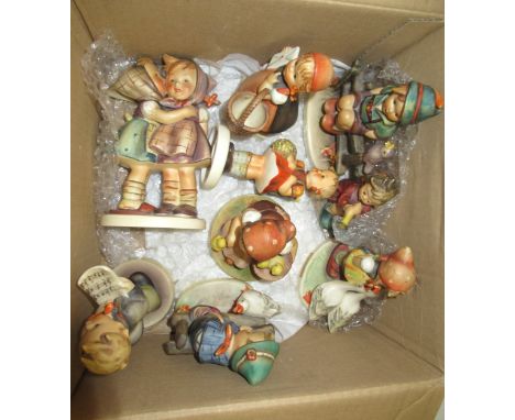 Group of nine various Hummel figures of childrenSome crazing, otherwise in good condition.