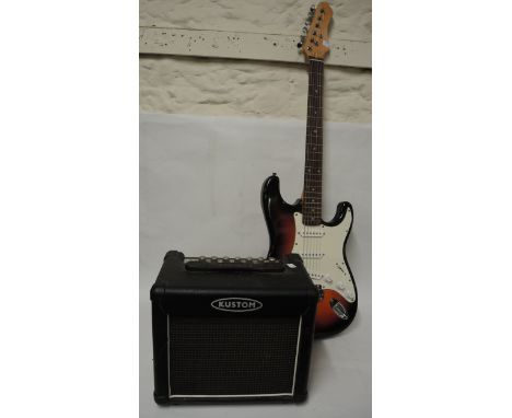 Stratocaster style six string electric guitar, together with a Kustom amplifier