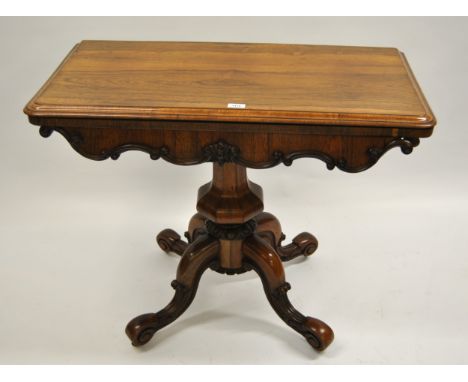 William IV rosewood rectangular card table with faceted bulbous column and cabriole carved supports with casters, 92 x 47 x 7