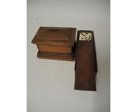 Boxed set of bone and ebony dominoes, together with a sarcophagus shaped money box