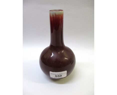 Chinese Sang du Boeuf baluster form narrow neck vase, signed with seal mark to base, 16cm highSome firing marks.