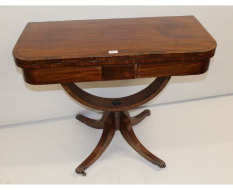 Late Regency rectangular mahogany crossbanded and line inlaid fold-over card table on U-shaped column and quadruped support