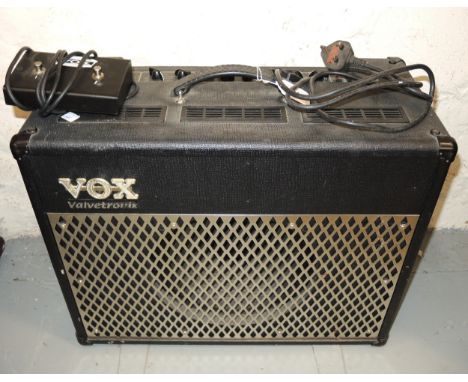Vox Valvetronix AD50 VT electric guitar amplifier with effects foot pedal, together with a microphone stand, music stand, Hoh