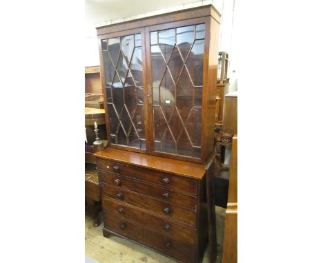 George III mahogany secretaire bookcase with two astragal glazed doors above a fitted drawer and three further long drawers b