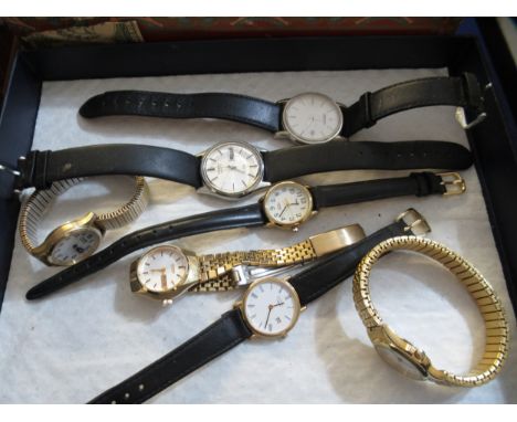 Collection of various fashion wristwatches including Seiko, Timex, Rotary, etc.