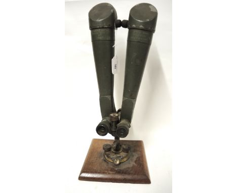 German binocular periscope by C.P. Goerz, Berlin, mounted on a later mahogany plinth, 54cm high overallSome paint losses to m