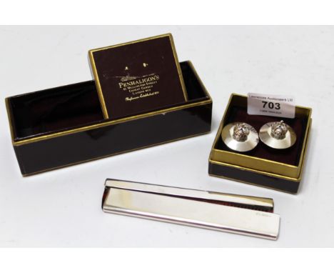Pair of Penhaligon's silver bottle stoppers, together with a Penhaligon's silver comb with case (both boxed)