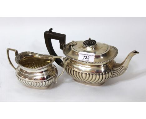 Early 20th Century silver half fluted design teapot and sugar basin, London 1919, 23oz t