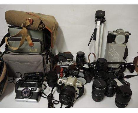Quantity of cameras and lenses including Olympus, Nikon, Pentax etc