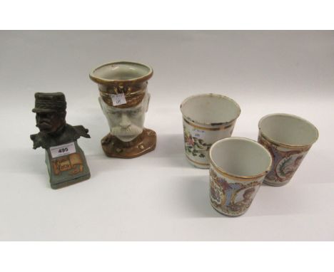Patinated spelter bust of Marshall Foch on a stoneware plinth, together with a pottery character jug and three enamel commemo